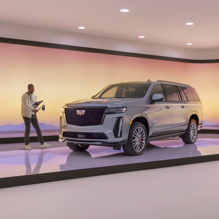 A Cadillac Live Agent Does a Walkaround of the Escalade in the Showroom