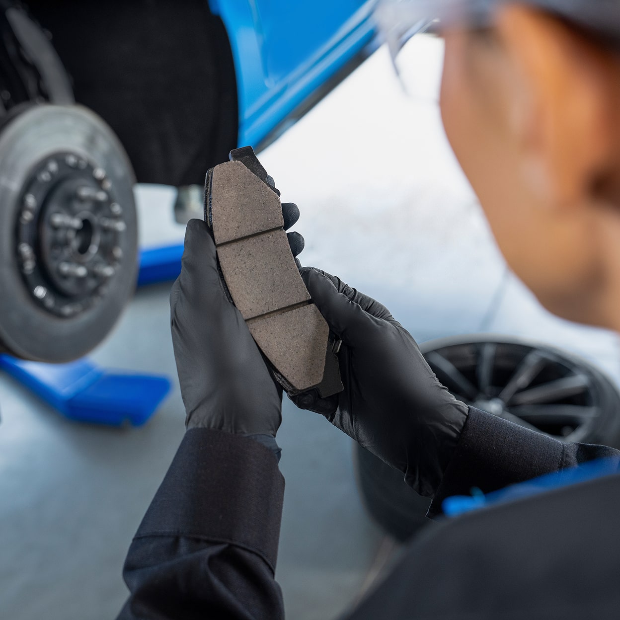 Brake Parts Laid Out Against a White Background