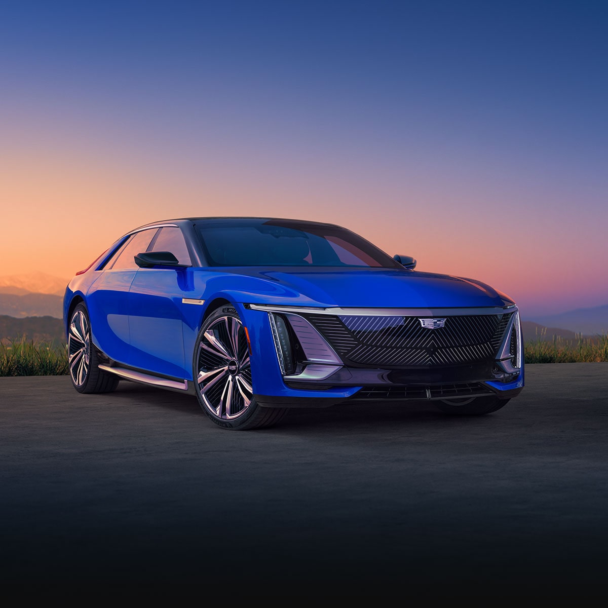 Three-quarter View of a Blue Ultra-Luxury Cadillac CELESTIQ Parked under a Beautiful Sunset