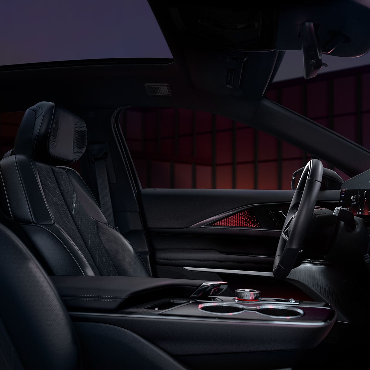 Interior de Cadillac LYRIQ-V 2027 con asientos de piel Negro y controles de la consola central.