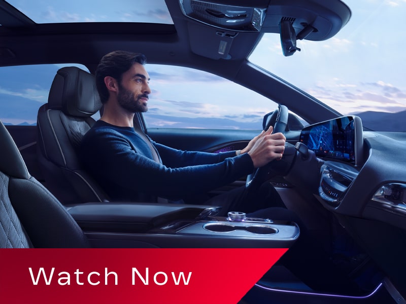 Video Thumbnail Showing a Driver Inside a 2027 Cadillac LYRIQ With a Panoramic Glass Roof and Interior Cabin Views.