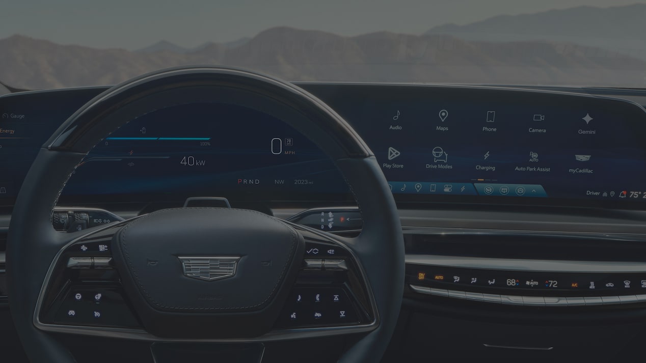 Interior of a 2027 Cadillac LYRIQ With a Steering Wheel, Digital Instrument Panel, and 33-Inch LED Display.