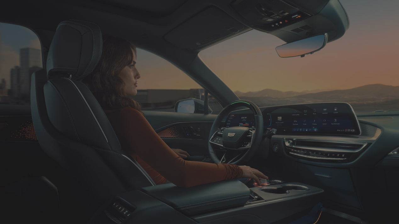 2027 Cadillac LYRIQ Interior With a Panoramic Glass Roof, 33-Inch LED Display, and Front Seating Area.