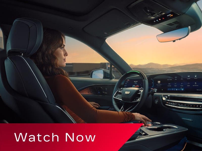 Video Thumbnail Showing the Interior of a 2027 Cadillac LYRIQ With a Panoramic Glass Roof, 33-Inch LED Display, and Front Seating Area.