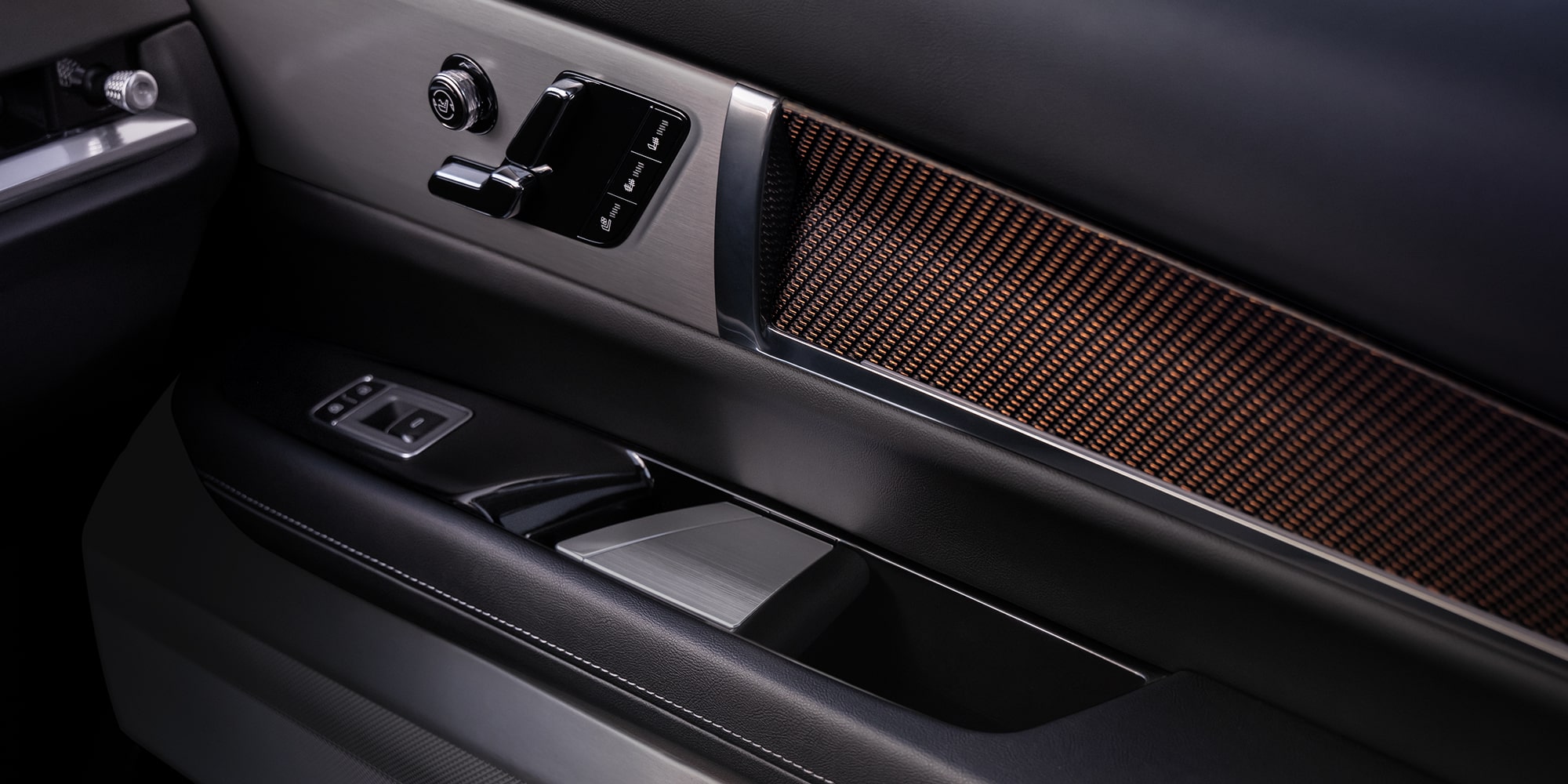 Close-up of the 2027 VISTIQ AKG Door Speaker and Seat Controls