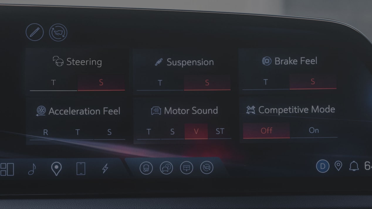 A Cadillac OPTIQ Infotainment Screen Showing Customizable Performance Settings Including Steering, Suspension, Brake Feel, Acceleration Feel, Motor Sound, And Competitive Mode.