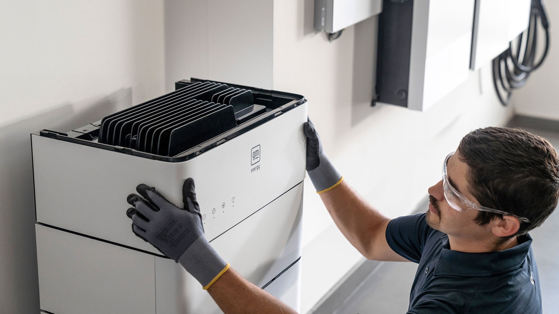 Close-up of a Technician Installing a GM Energy Home System