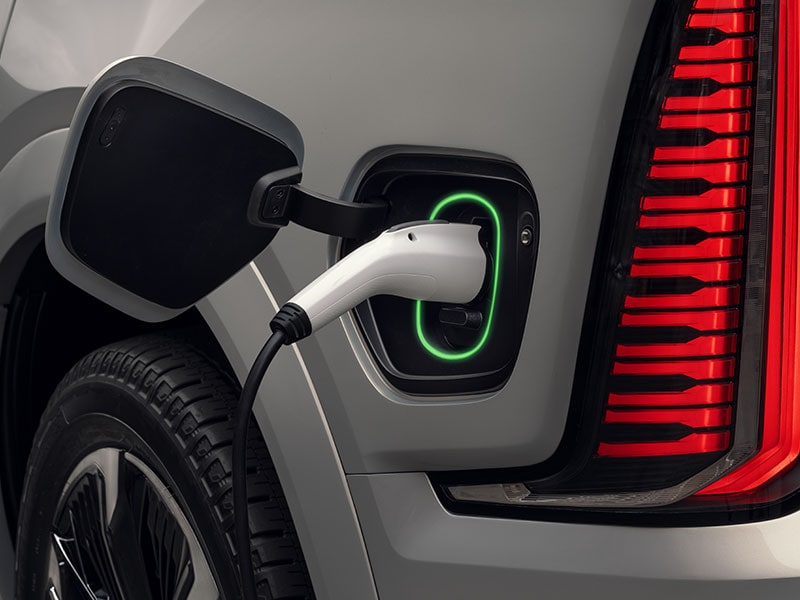 Close-up of a Charger Plugged into a Cadillac EV's Charging Port