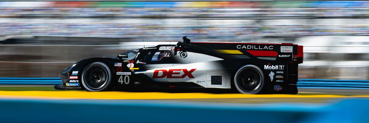 Close-up of a Cadillac Racecar Driver in the Front Seat