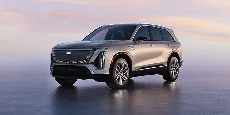 A Cadillac LYRIQ Electric Vehicle Driving on a Bridge