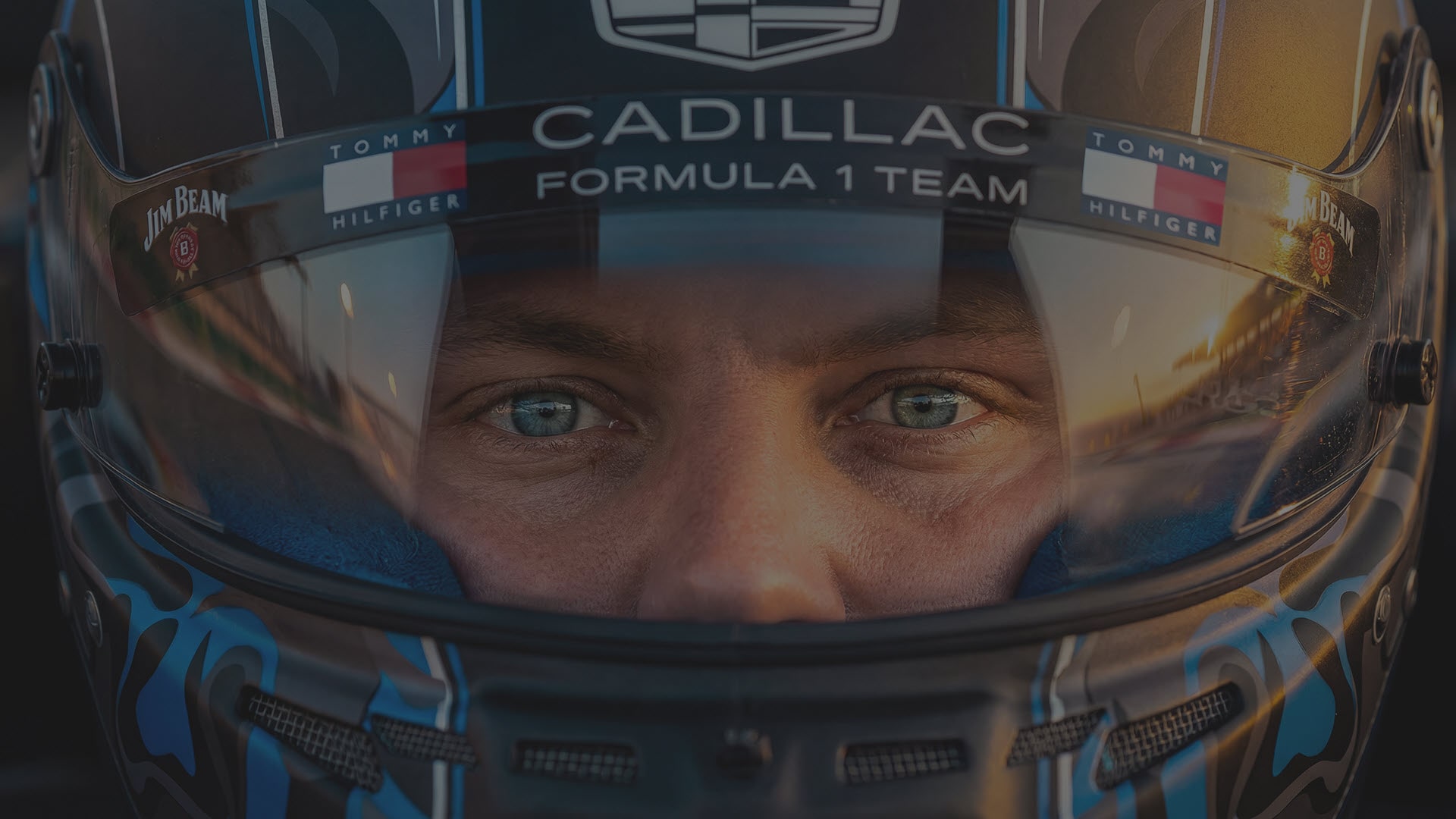 Rear View of the Cadillac F1 Racecar and its Brake Lights On with Text Overlay Reading "This Day Matters"