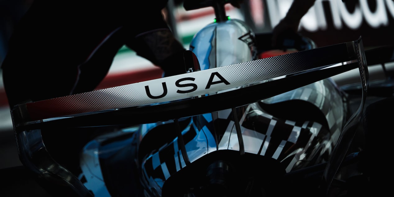 Detail View Of F1 Car Featuring USA Text On Rear Wing.