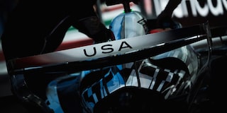 Detail View Of F1 Car Featuring USA Text On Rear Wing.