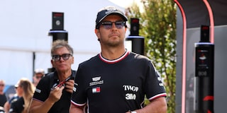 Sergio "Checo" Perez Pre-Race Arrival Wearing Black Cadillac Attire.