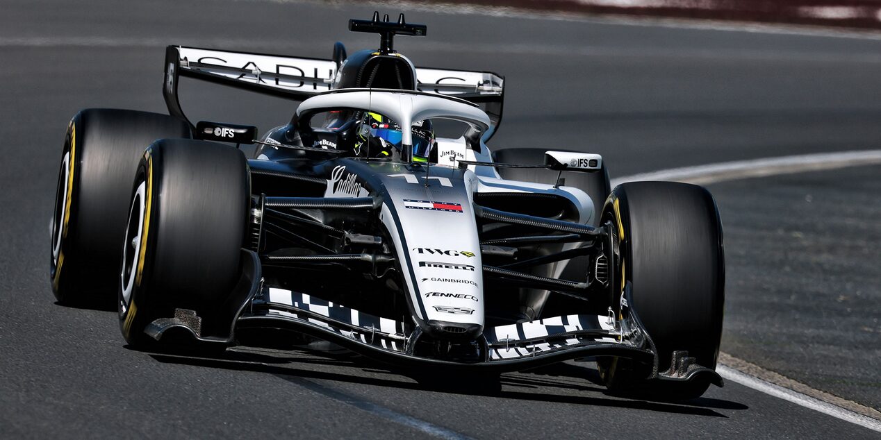 Front View of the White Cadillac F1 Racecar Parked on a Track