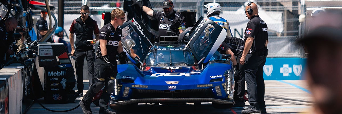 The Blue No. 10 Cadillac V-Series.R Racecar Driving on a Track