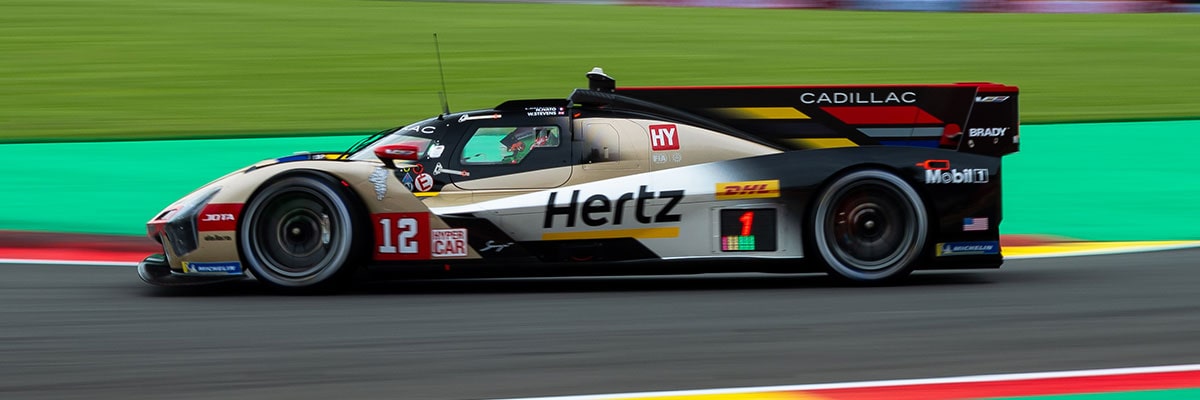 Profile View of the No.12 Cadillac V-Series.R Racecar Speeding on a Race Track