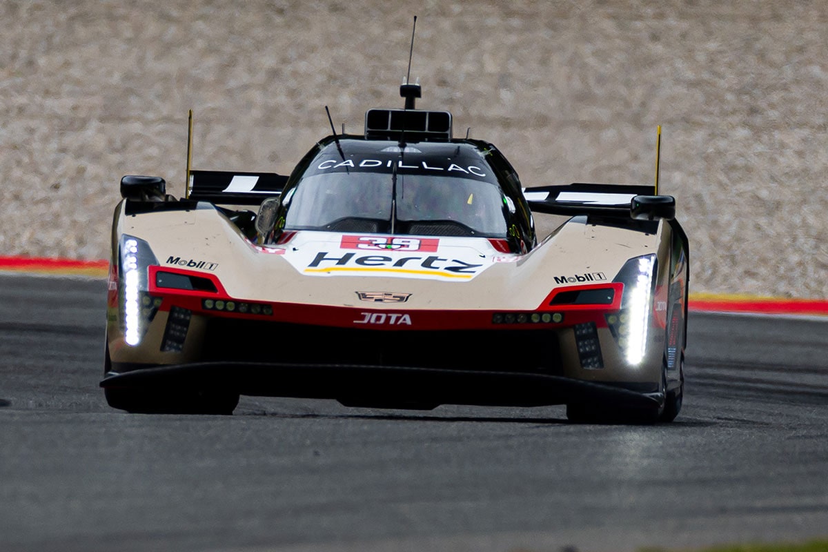 Front View of the No.38 Cadillac V-Series.R Racecar Driving on a Race Track