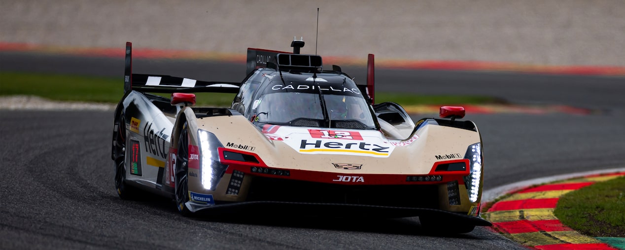 Front View of the No.12 Cadillac V-Series.R Racecar Driving on a Race Track