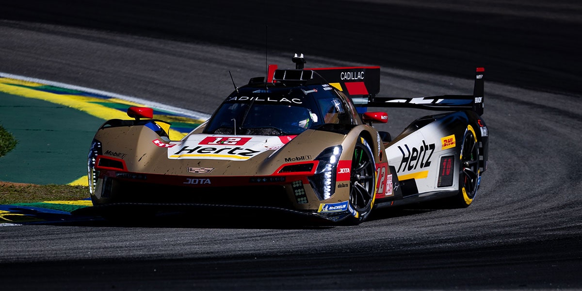 Darkened, Three-quarter View of the Gold No. 38 Cadillac Race Car