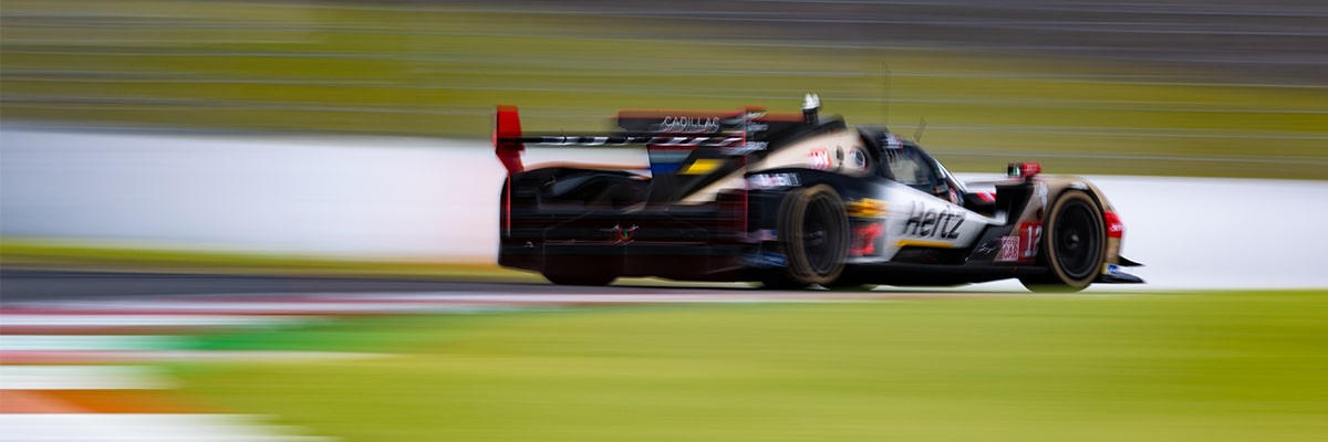 Profile View of the Cadillac V-Series.R Hypercar Burning Out on a Race Track