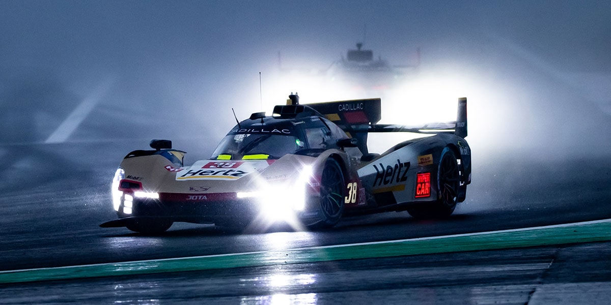 Side View of Cadillac JOTA Race Car Speeding Down the Track