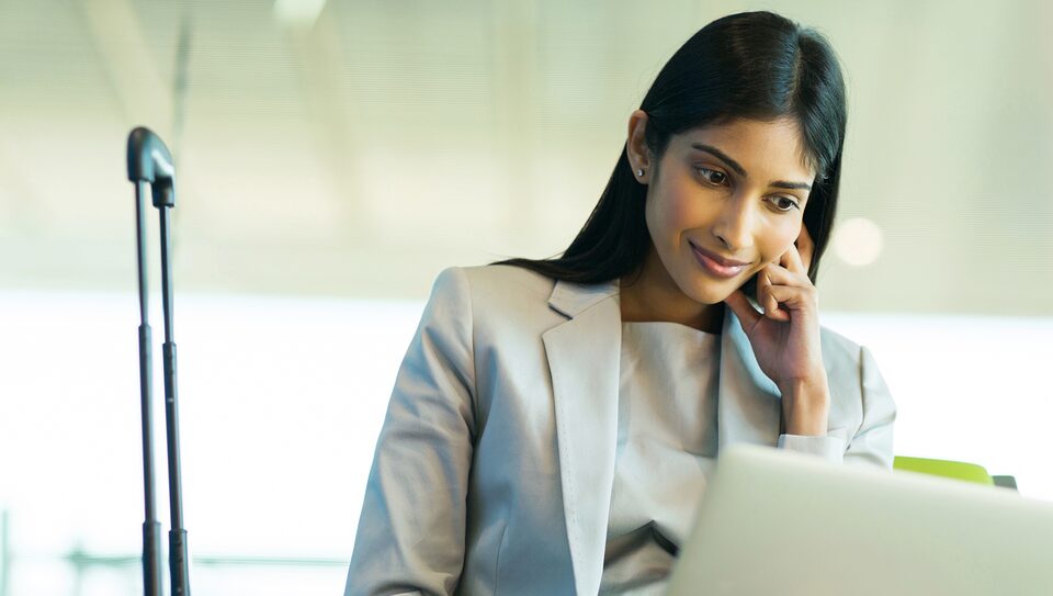 Woman Checking Her GM Business Card Balance Online