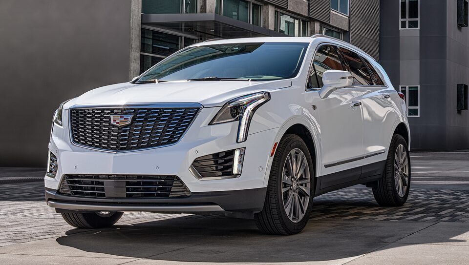Cadillac XT5 Parked in Front of Apartment Building