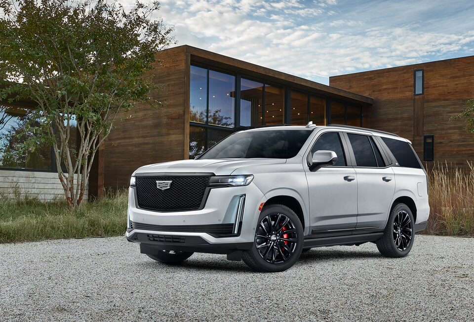 Cadillac Escalade New Vehicle Parked in Driveway
