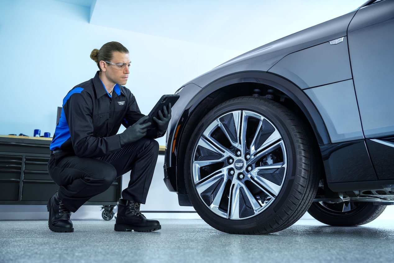 Man working on Cadillac vehicle service