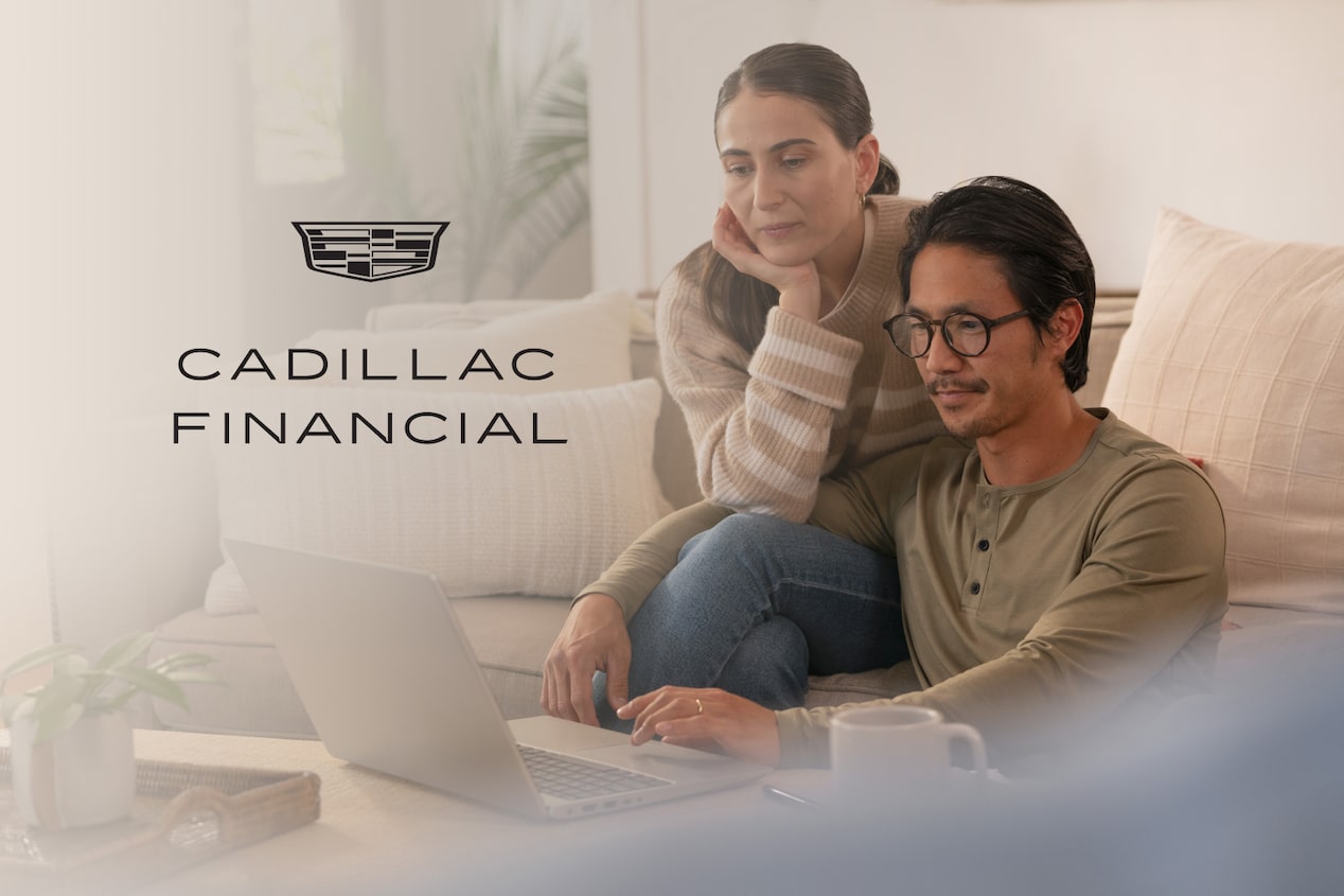 Couple checking their Cadillac Financial Account