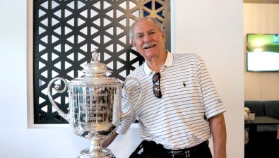 Ben standing next to the PGA Championship trophy