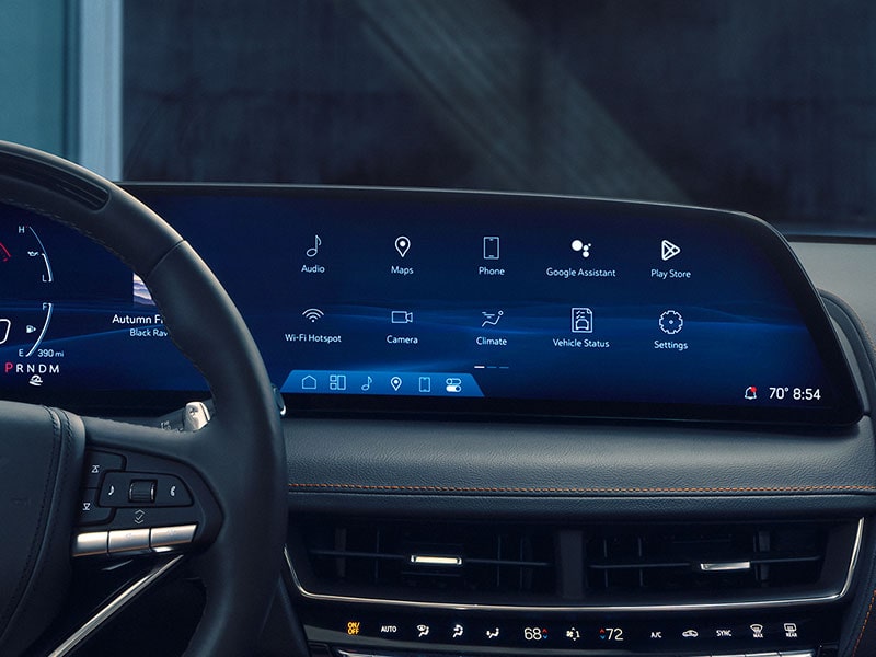 Close-up of the Google Built-in Apps Displayed on the Infotainment System of a Cadillac Vehicle