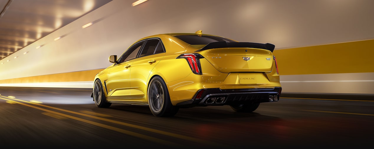 Rear View of a Yellow CT4-V Blackwing Driving Through a Underground Tunnel