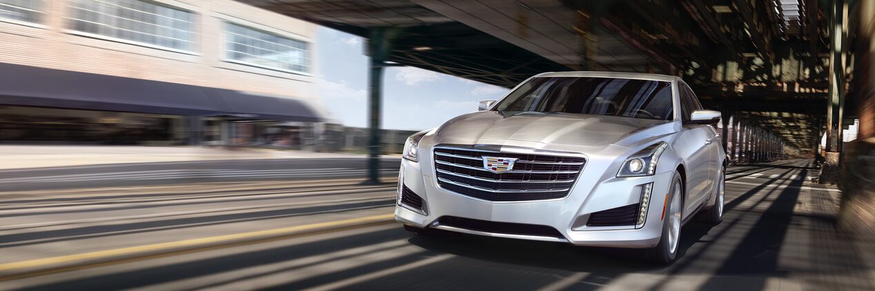 CTS Sedan Driving Under Bridge