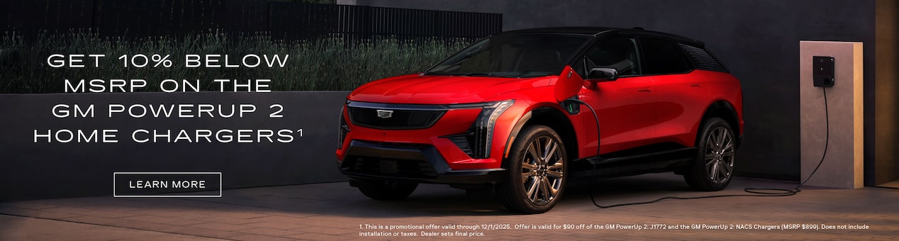 Three-quarter View of a 2026 Cadillac VISTIQ Parked Under a Beautiful Sky Next to a Current Offers Promotional Text for All Cadillac Models