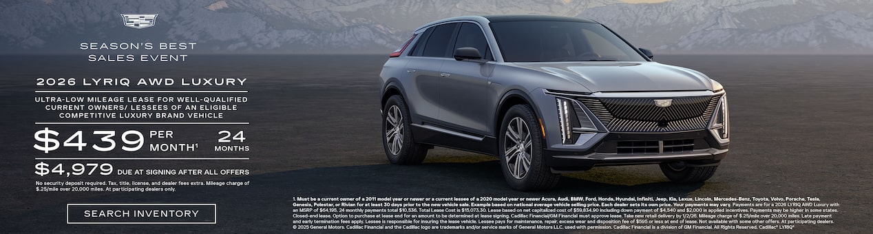 Three-quarter View of a 2025 Cadillac ESCALADE IQ Parked Under a Beautiful Sky Next to a Current Offers Promotional Text