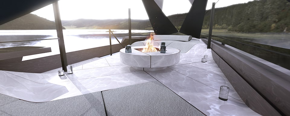 A Fire Pit in the  Cadillac OpenSpace Concept Vehicle Parked near Water