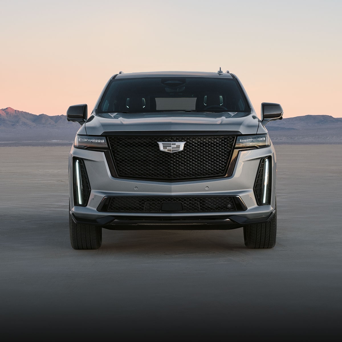 2024 Cadillac Escalade V Head On View Parked with Sunset in Background