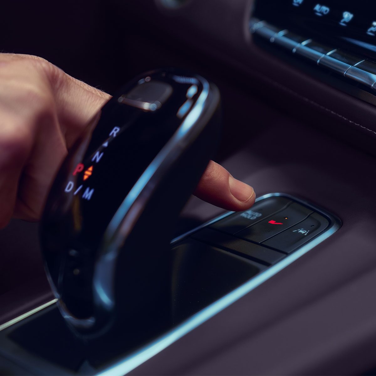 Driver Selecting V Driving Mode Inside the 2024 Escalade