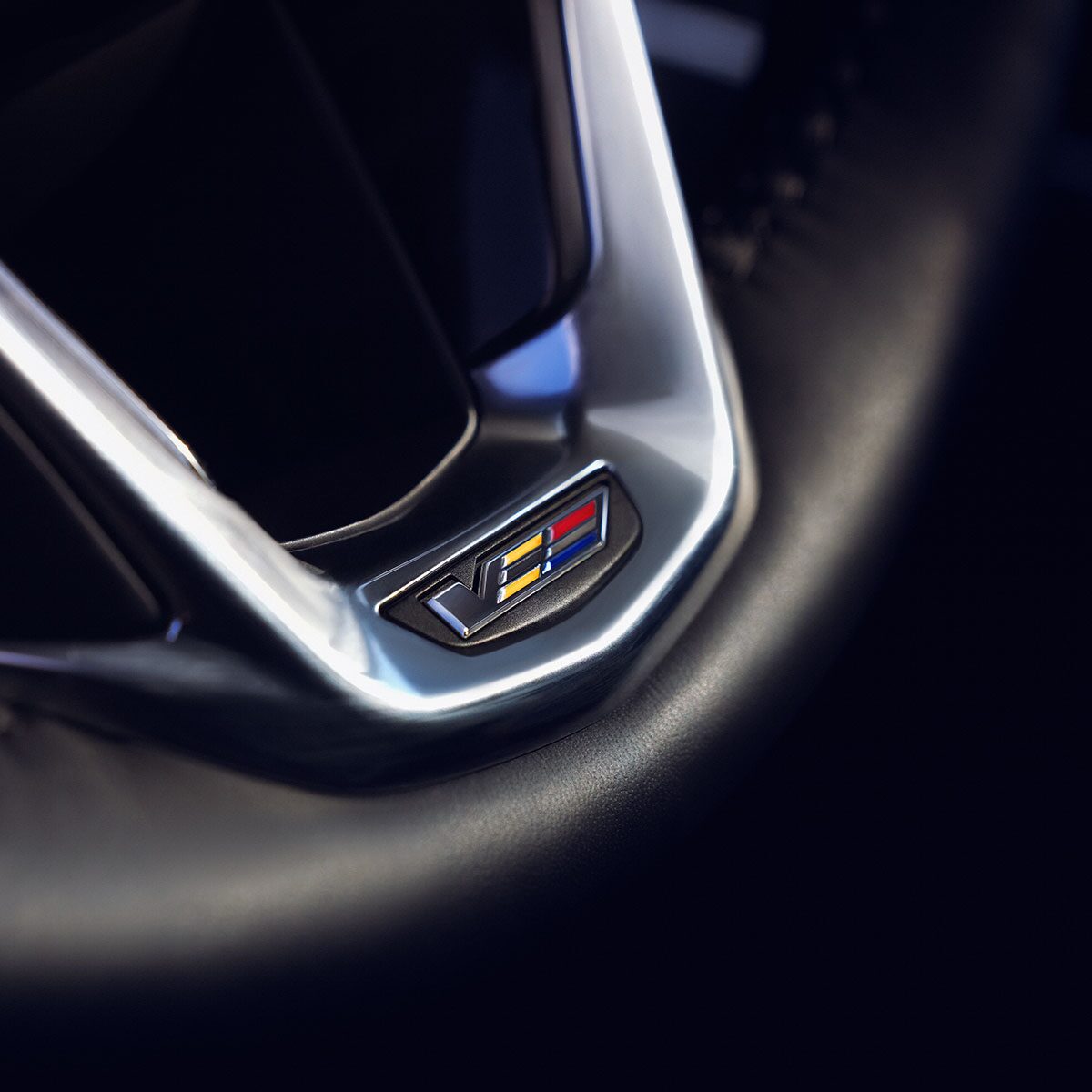 Cadillac Logo on Steering Wheel Inside the 2024 Cadillac Escalade V