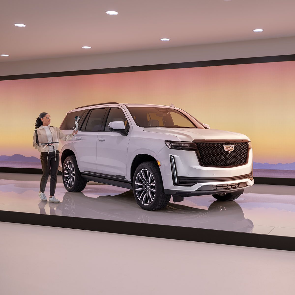Cadillac LIVE Product Specialist Showing the Cadillac Escalade V in Showroom