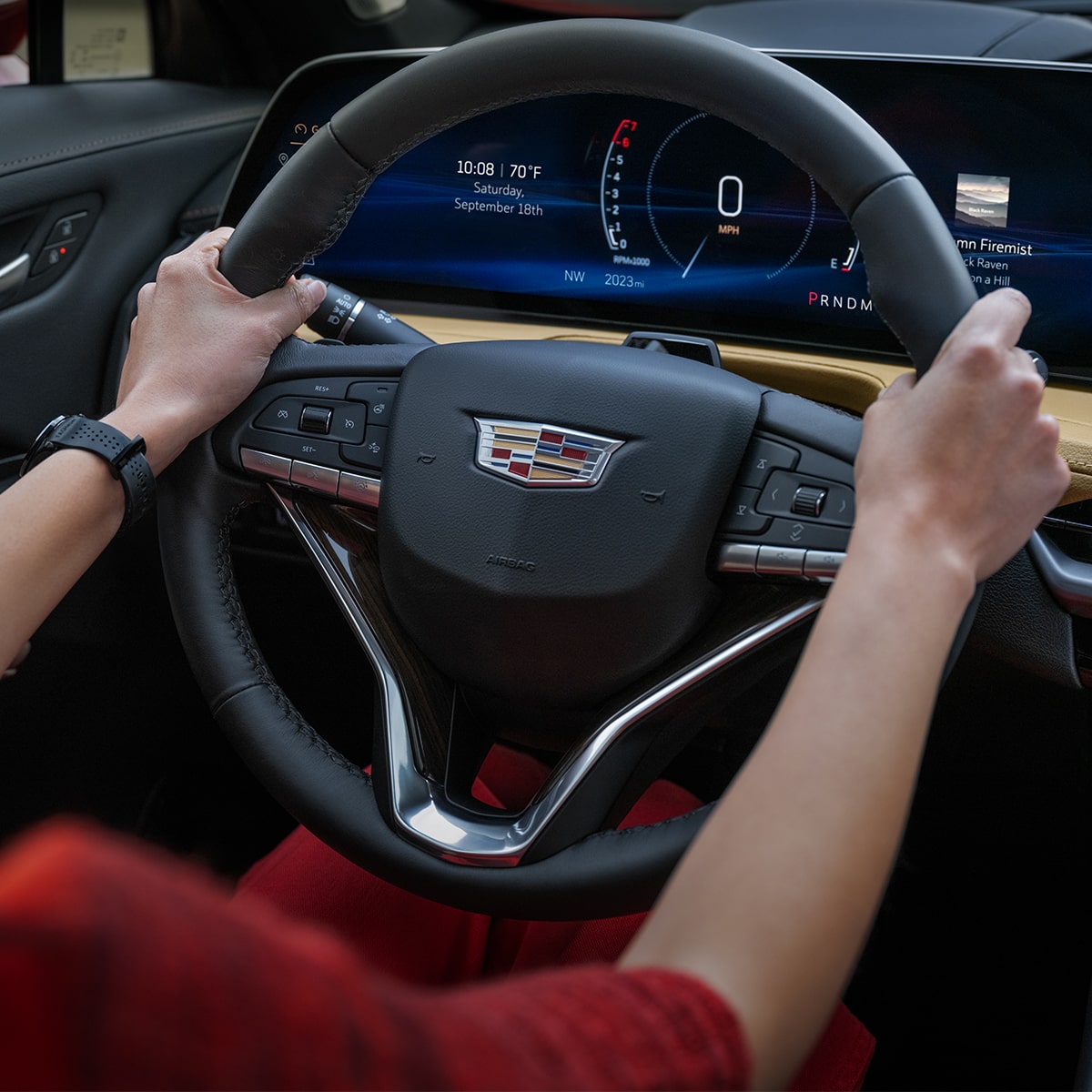 A Woman Enjoys the Immersive Driver Controls of Her XT4