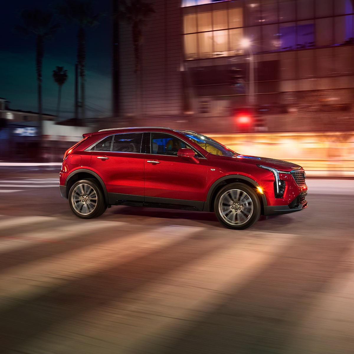 The XT4 Passing a Crosswalk while Driving Through the City at Night