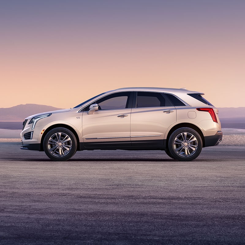 The Crystal White Cadillac XT5 Parked During a Breathtaking Sunrise