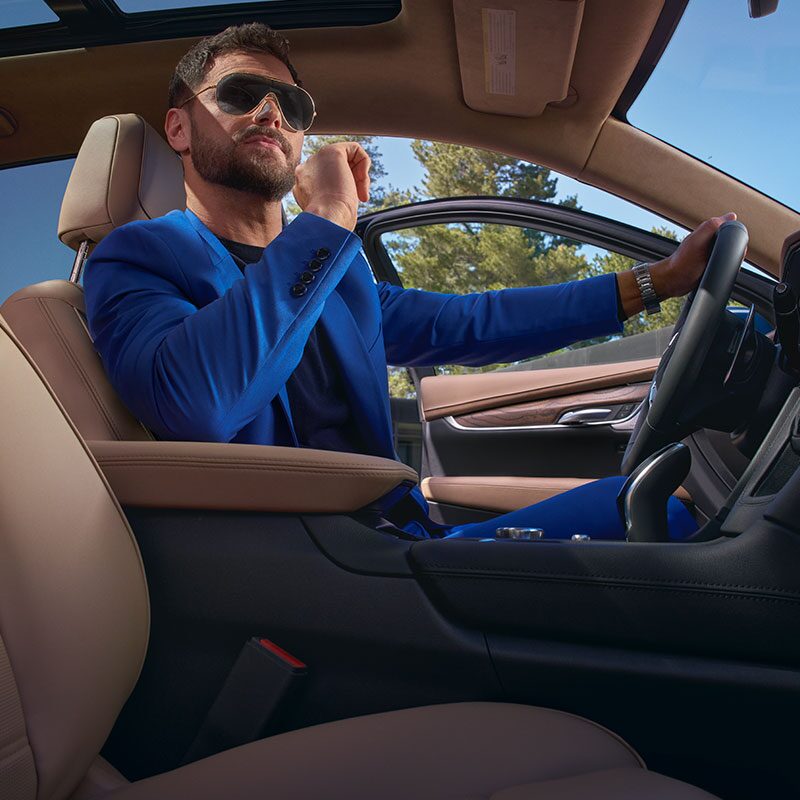 The Driver Looking in the Rear View Mirror in the Luxurious Cadillac XT5