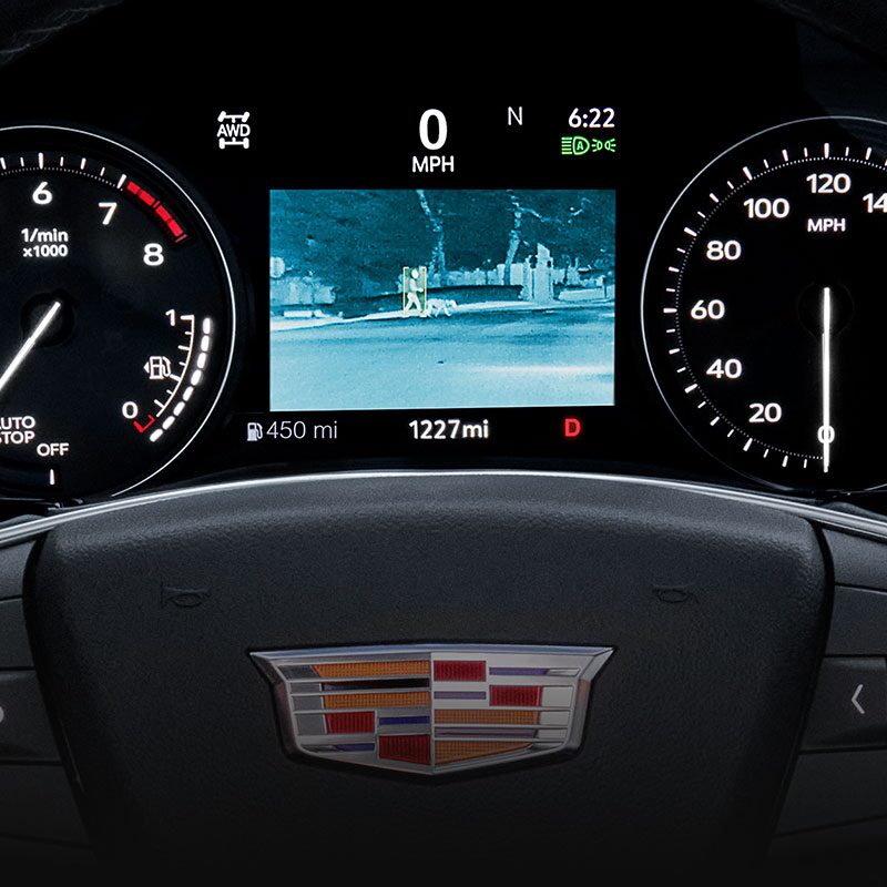 A Man Uses the Night Vision Technology of the Cadillac XT5