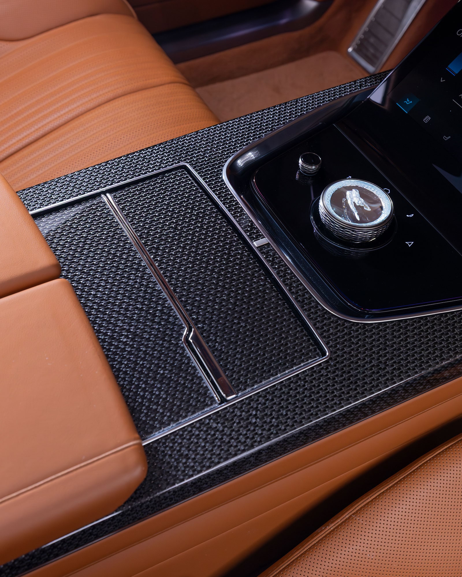 A Detailed View of the Cadillac CELESTIQ Car's Front Wheel and Electric Charging Port.