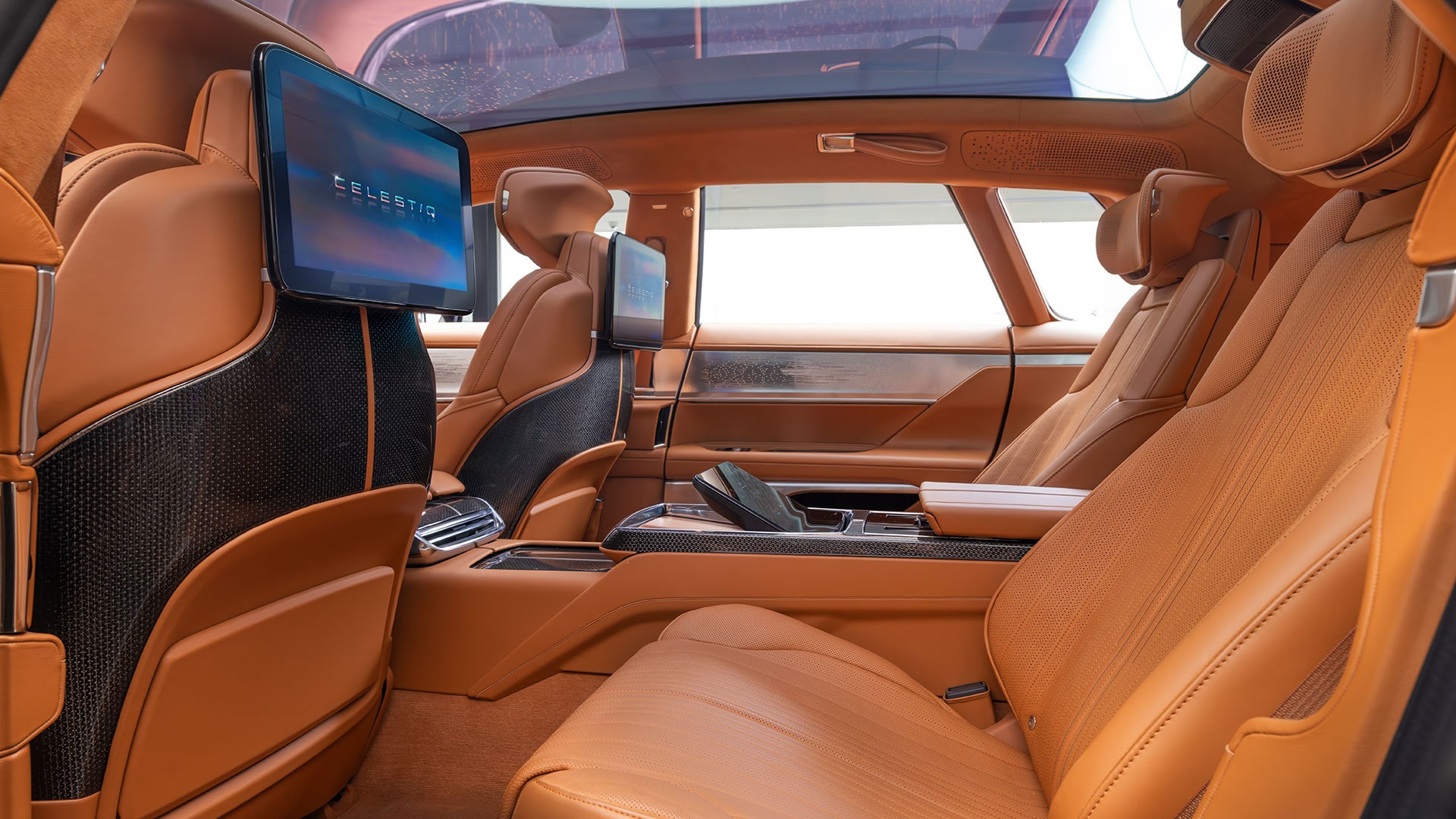 The Cadillac CELESTIQ Car's Luxurious Interior Shows a Wide Dashboard with Multiple Digital Screens.test