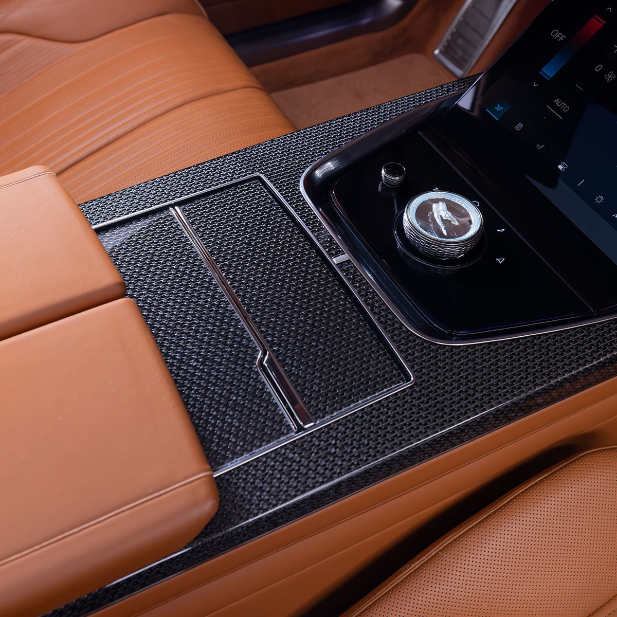 A Detailed View of the Cadillac CELESTIQ Car's Front Wheel and Electric Charging Port.